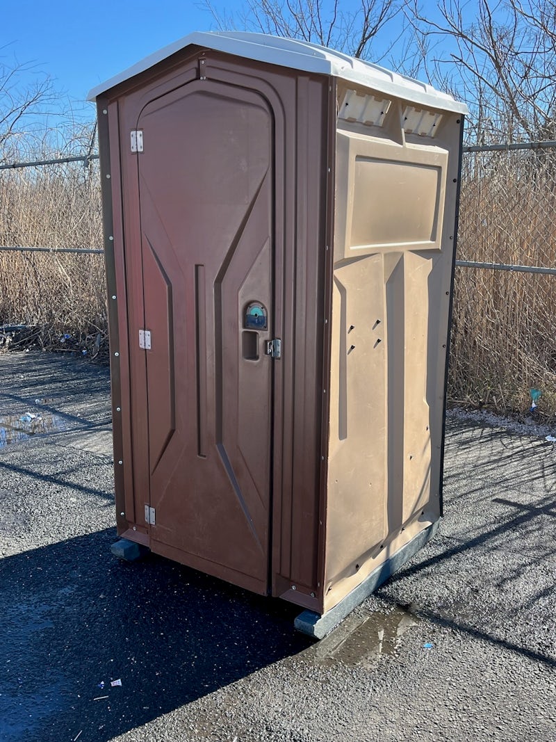200 brown and tan Satellite Tufway Portable Toilets